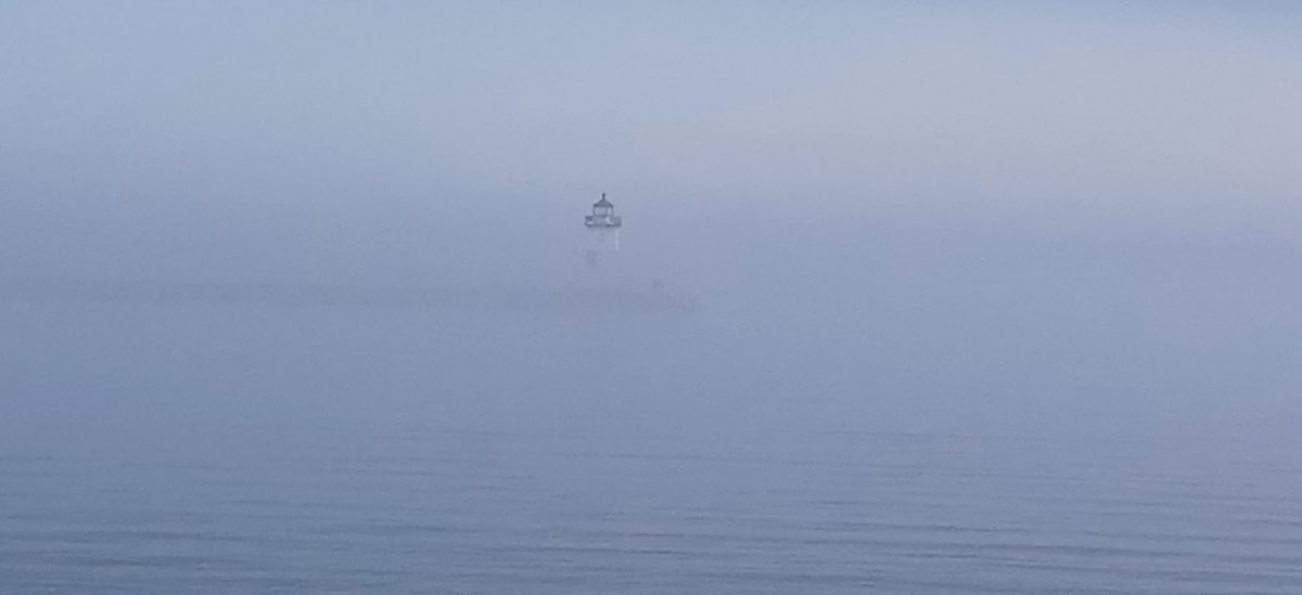 photo of lighthouse in fog, Grand Marais, Minnesota