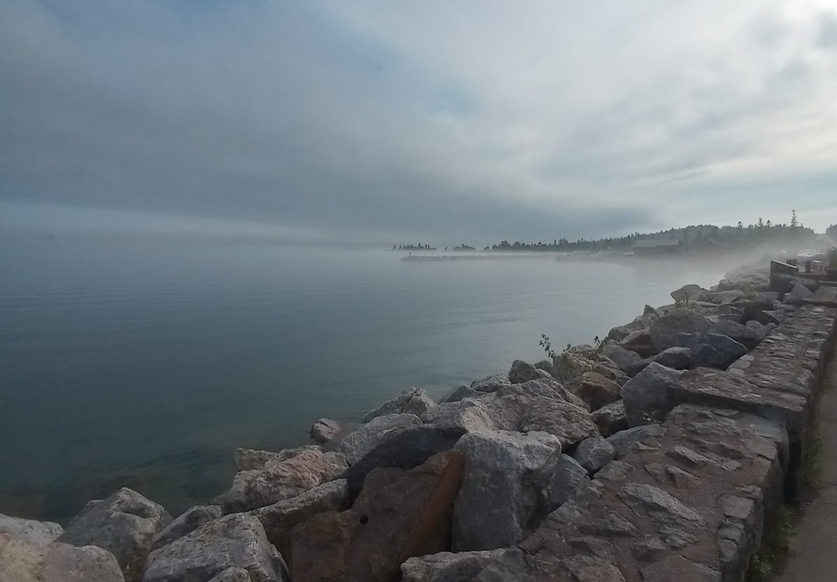 photo of Lake Superior bay with fog