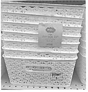 Exhibit photo of a stack of storage bins accused of infringement due to use of material pattern